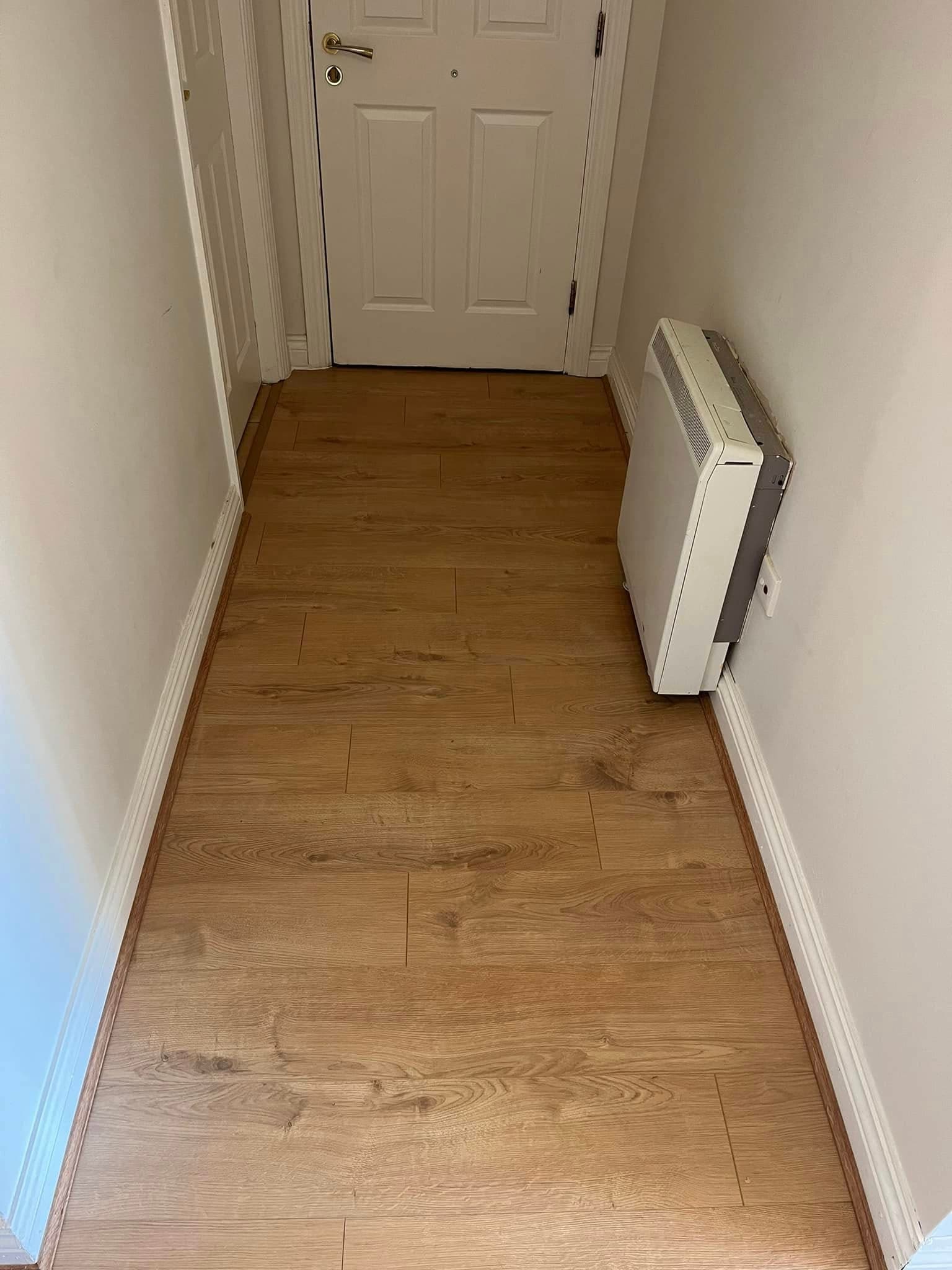 Hallway after new wooden flooring installation East Cork