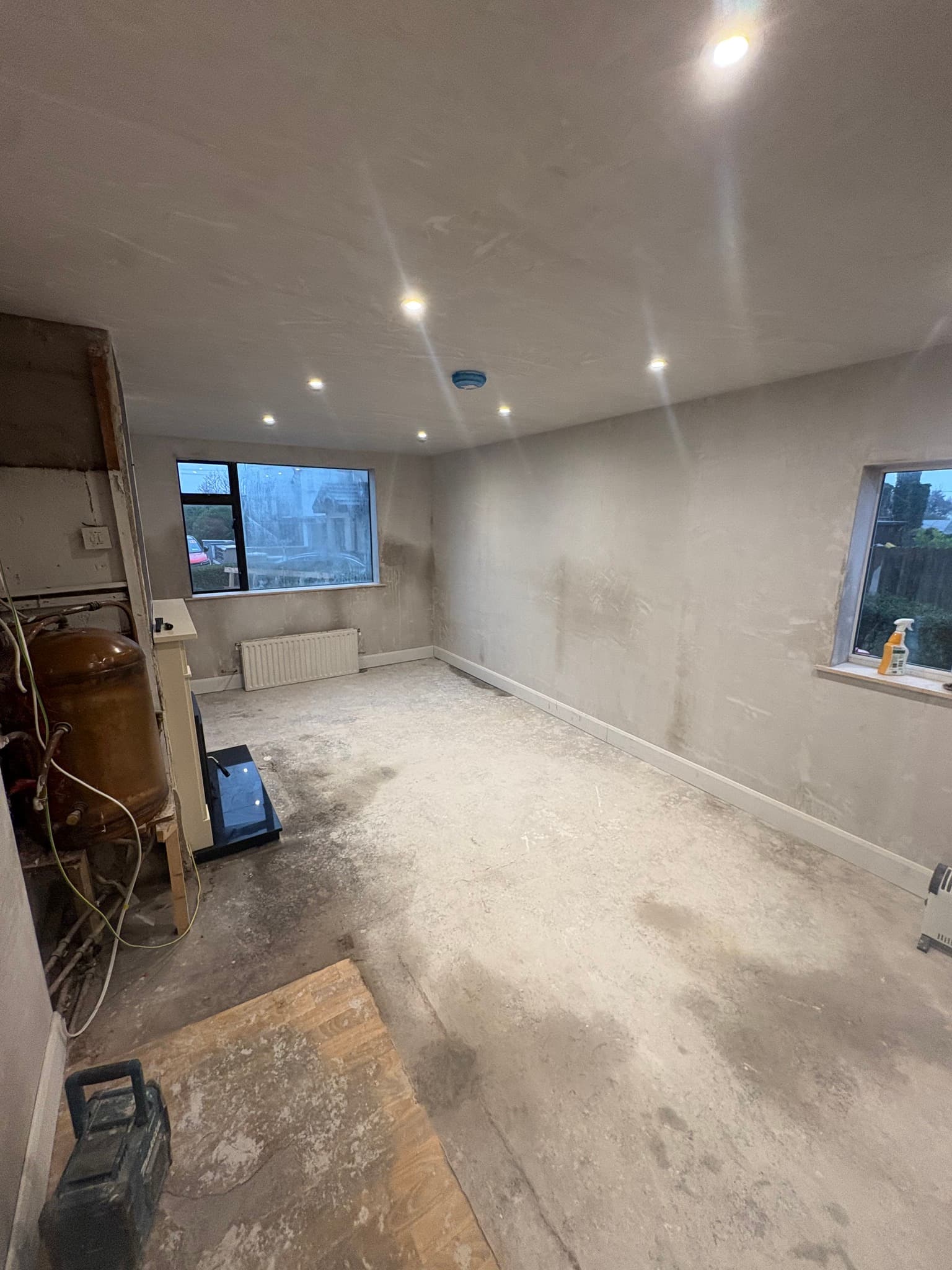 Living room renovation with modern finishes by Morley Services in East Cork