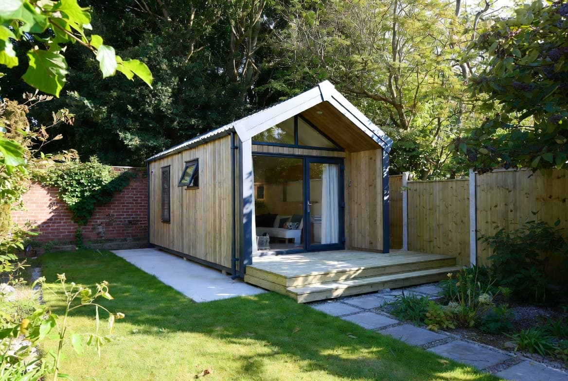 Pitched-roof modular home with full-height glazing