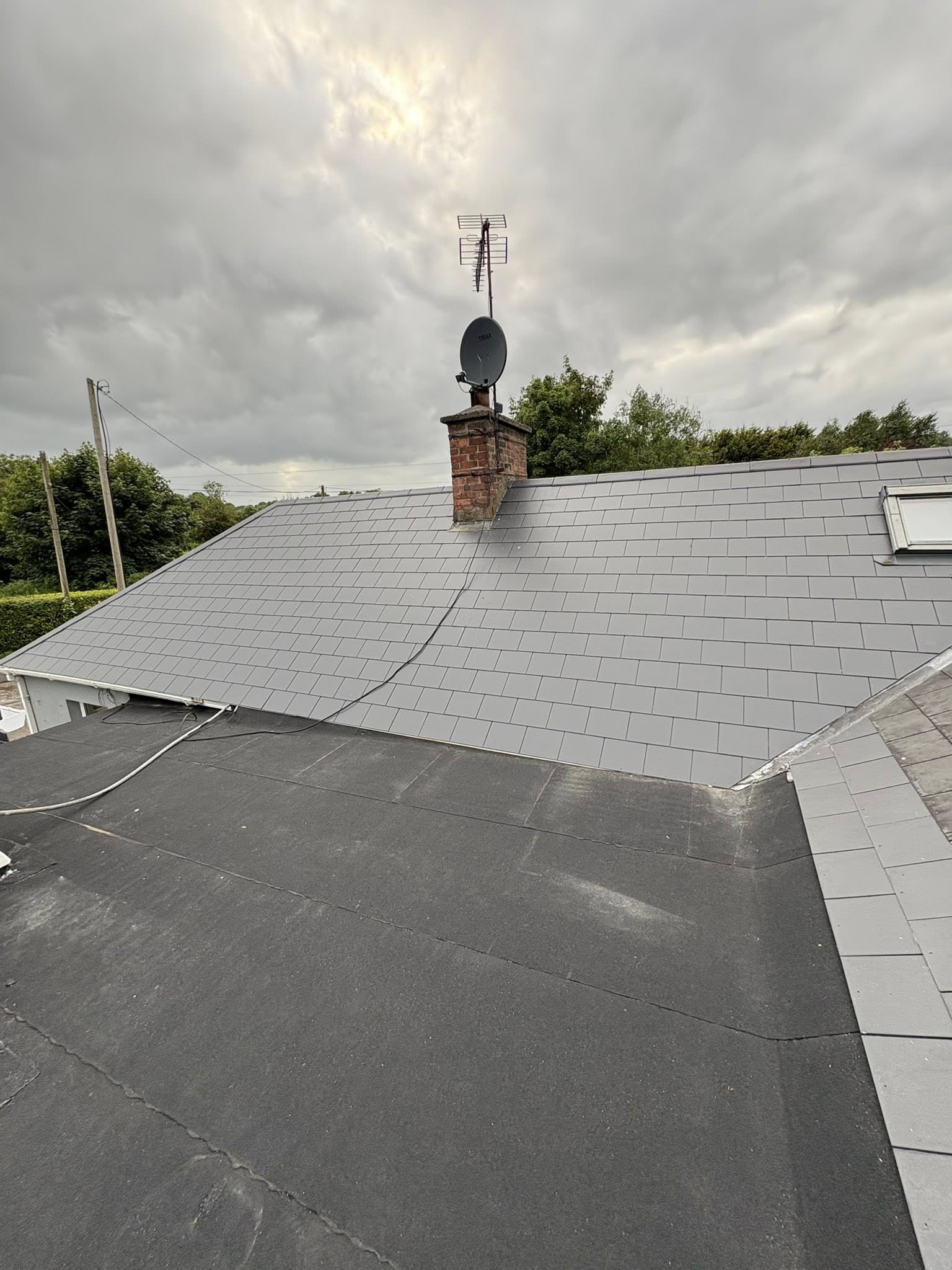 Multi-roof section after renovation in East Cork by Morley Services